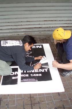 Setting up posters.