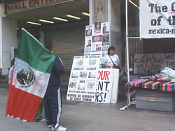 Here a man stops to see the posters and to read on the history of the crimes of the Europeans on our continent.